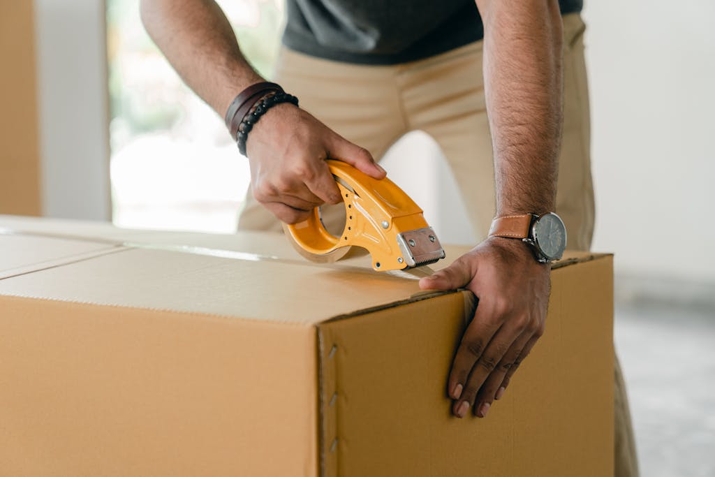 tenant move out process taping up a moving box